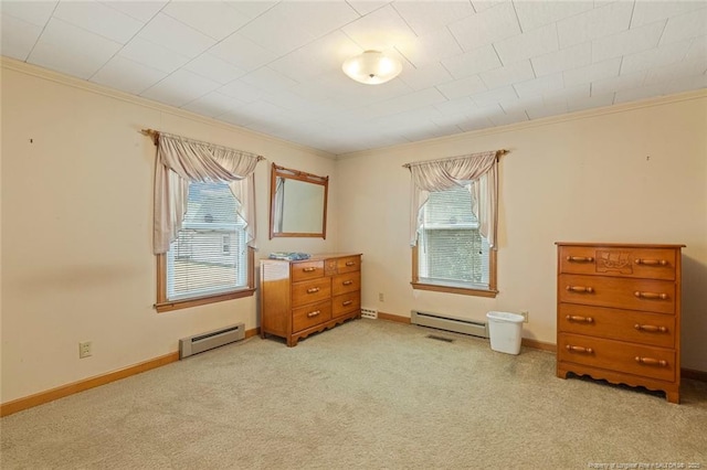 bedroom featuring light carpet, a baseboard radiator, multiple windows, and crown molding