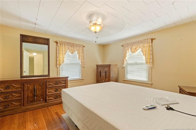 bedroom featuring wood finished floors