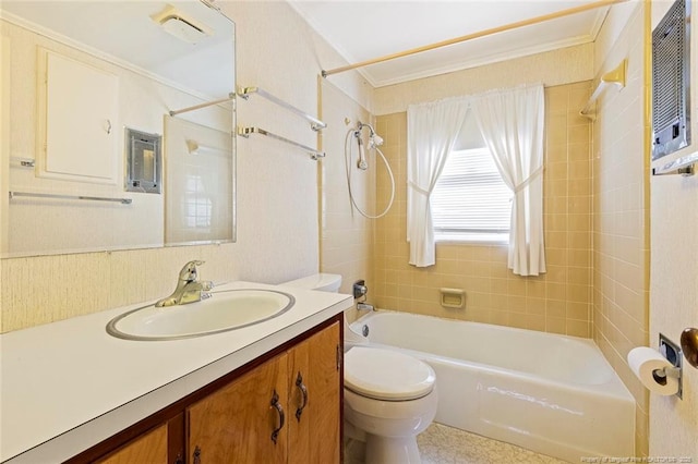 full bathroom featuring bathtub / shower combination, crown molding, vanity, and toilet