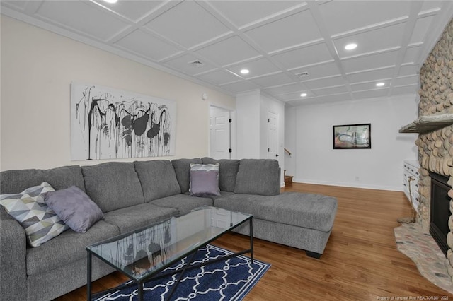 living area featuring a fireplace, recessed lighting, wood finished floors, coffered ceiling, and baseboards