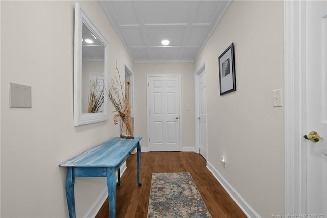 entryway featuring baseboards and wood finished floors