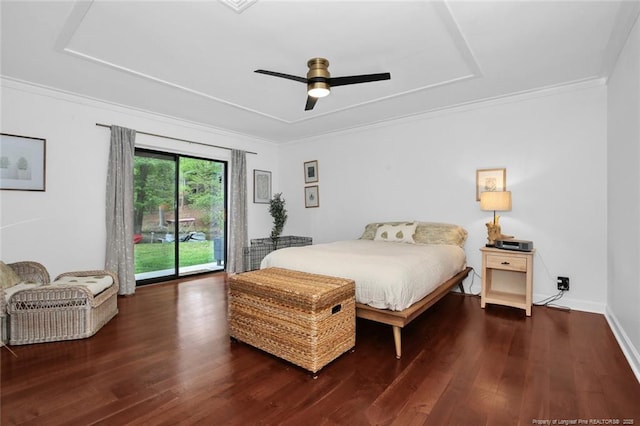 bedroom with access to exterior, crown molding, baseboards, and wood finished floors