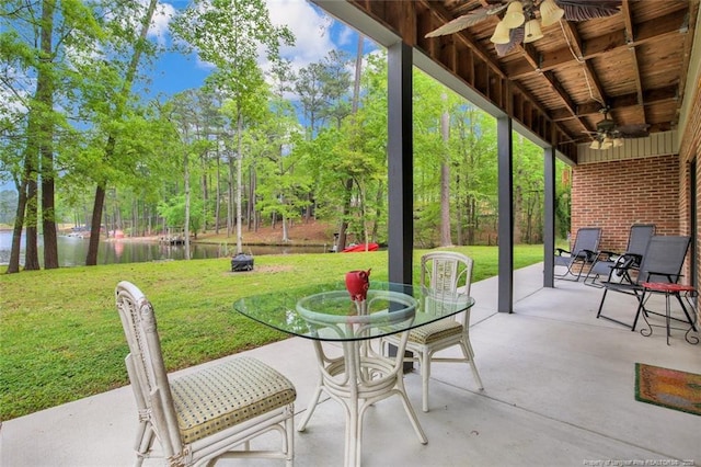 view of patio / terrace featuring a ceiling fan and outdoor dining area