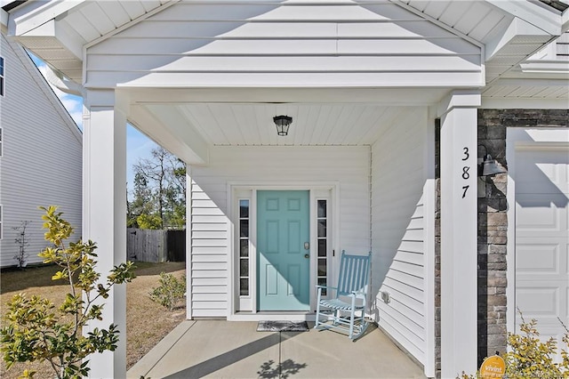 property entrance with a garage