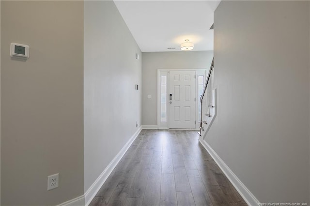 387 Springhaven Dr, Raeford, NC 28376 - entryway featuring baseboards, dark wood finished floors, and stairs