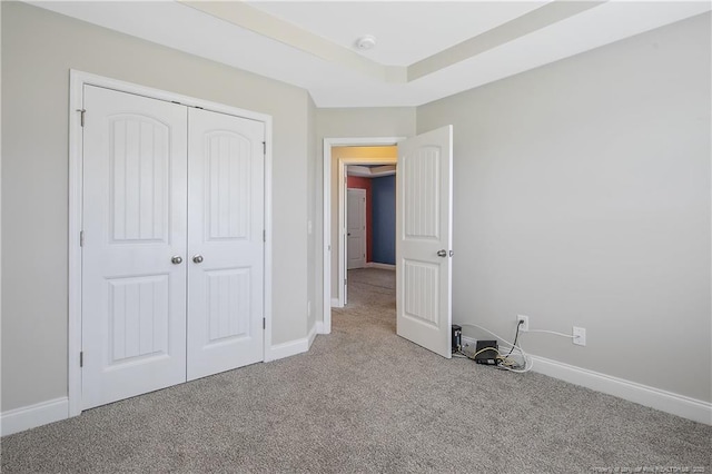 387 Springhaven Dr, Raeford, NC 28376 - unfurnished bedroom featuring carpet, baseboards, and a closet