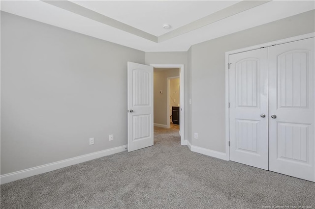 387 Springhaven Dr, Raeford, NC 28376 - unfurnished bedroom featuring carpet, baseboards, and a closet