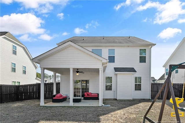 387 Springhaven Dr, Raeford, NC 28376 - rear view of property featuring a ceiling fan, an outdoor living space, a fenced backyard, and a patio area