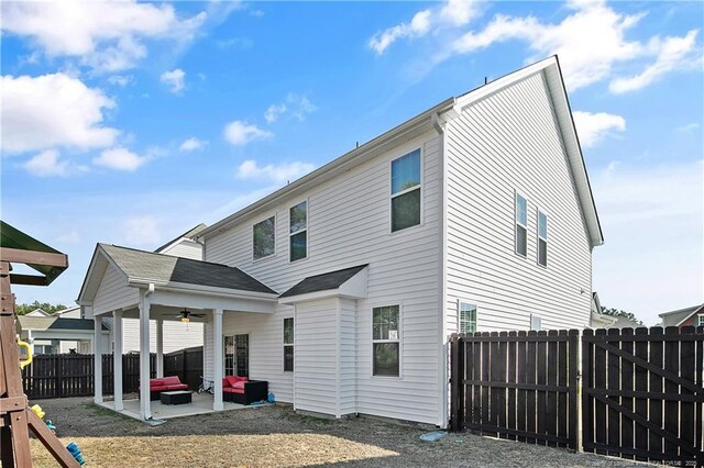 387 Springhaven Dr, Raeford, NC 28376 - rear view of property with a ceiling fan, a patio area, an outdoor living space, and a fenced backyard