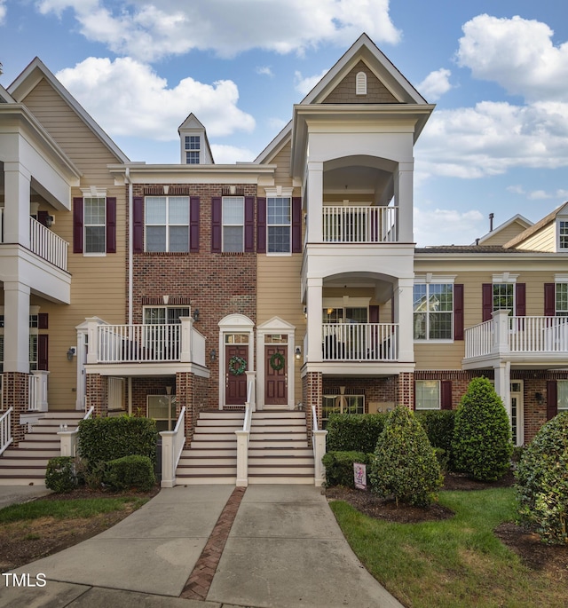 multi unit property featuring brick siding