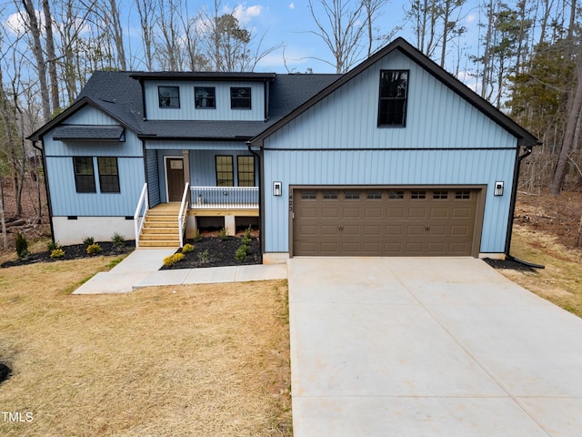 modern farmhouse style home with covered porch, a shingled roof, concrete driveway, a front lawn, and crawl space