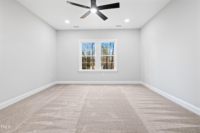 carpeted empty room with recessed lighting, visible vents, baseboards, and ceiling fan