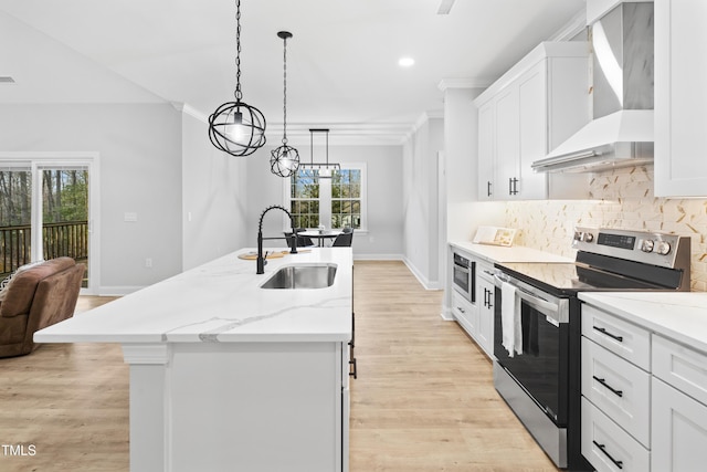 kitchen featuring a kitchen island with sink, backsplash, stainless steel range with electric stovetop, wall chimney exhaust hood, and a sink