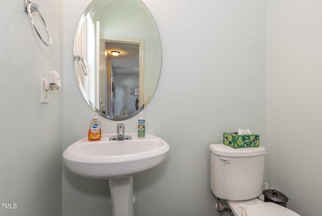 bathroom featuring toilet