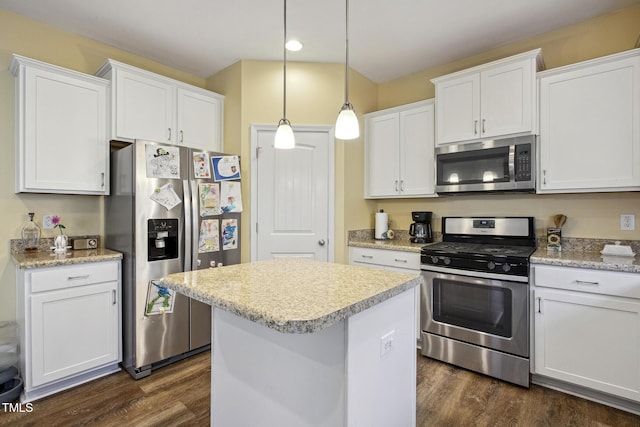 kitchen featuring white cabinets, dark wood-style floors, and appliances with stainless steel finishes