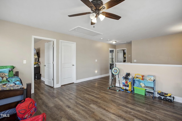 playroom featuring baseboards, wood finished floors, attic access, and ceiling fan