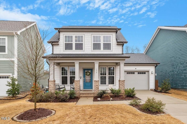 view of front of home with roof with shingles, an attached garage, covered porch, concrete driveway, and brick siding