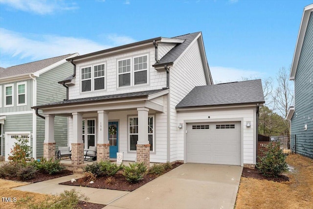 craftsman inspired home featuring fence, concrete driveway, roof with shingles, covered porch, and a garage