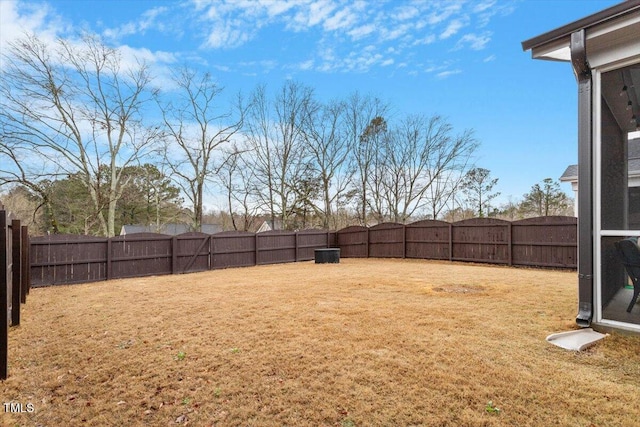 view of yard with a fenced backyard