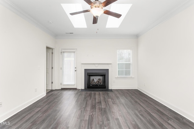 unfurnished living room featuring crown molding, a fireplace with flush hearth, and dark wood-style flooring