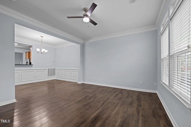 interior space featuring visible vents, dark wood-style flooring, crown molding, and ceiling fan with notable chandelier