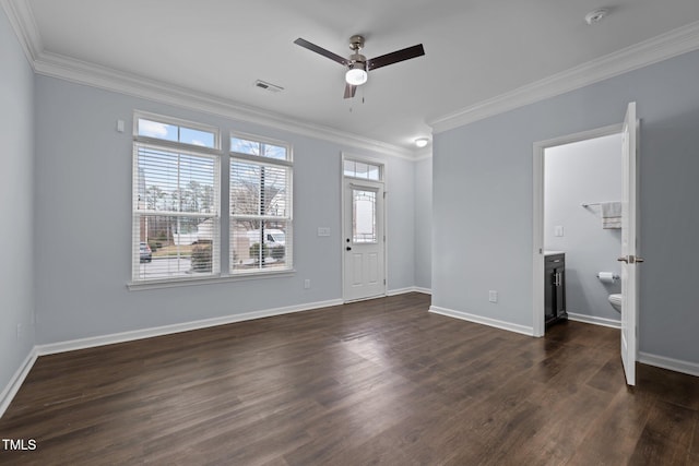 interior space with baseboards, crown molding, visible vents, and dark wood-type flooring