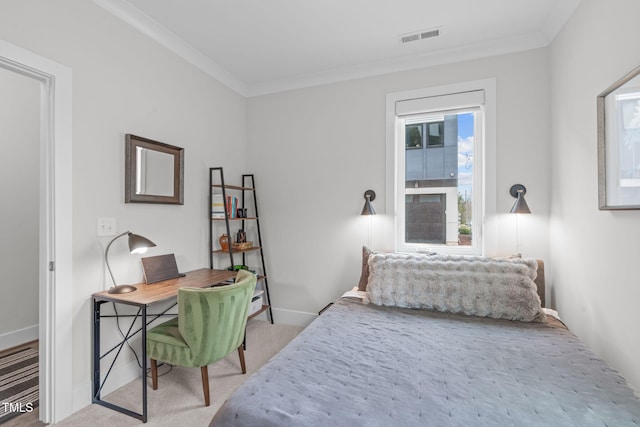 carpeted bedroom with baseboards, visible vents, and ornamental molding