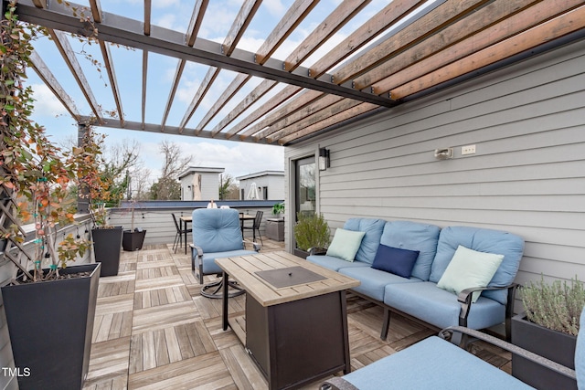 wooden terrace featuring an outdoor living space and a pergola