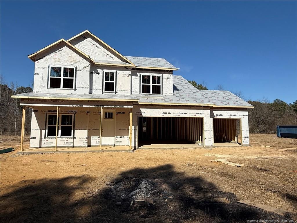 property under construction featuring a garage