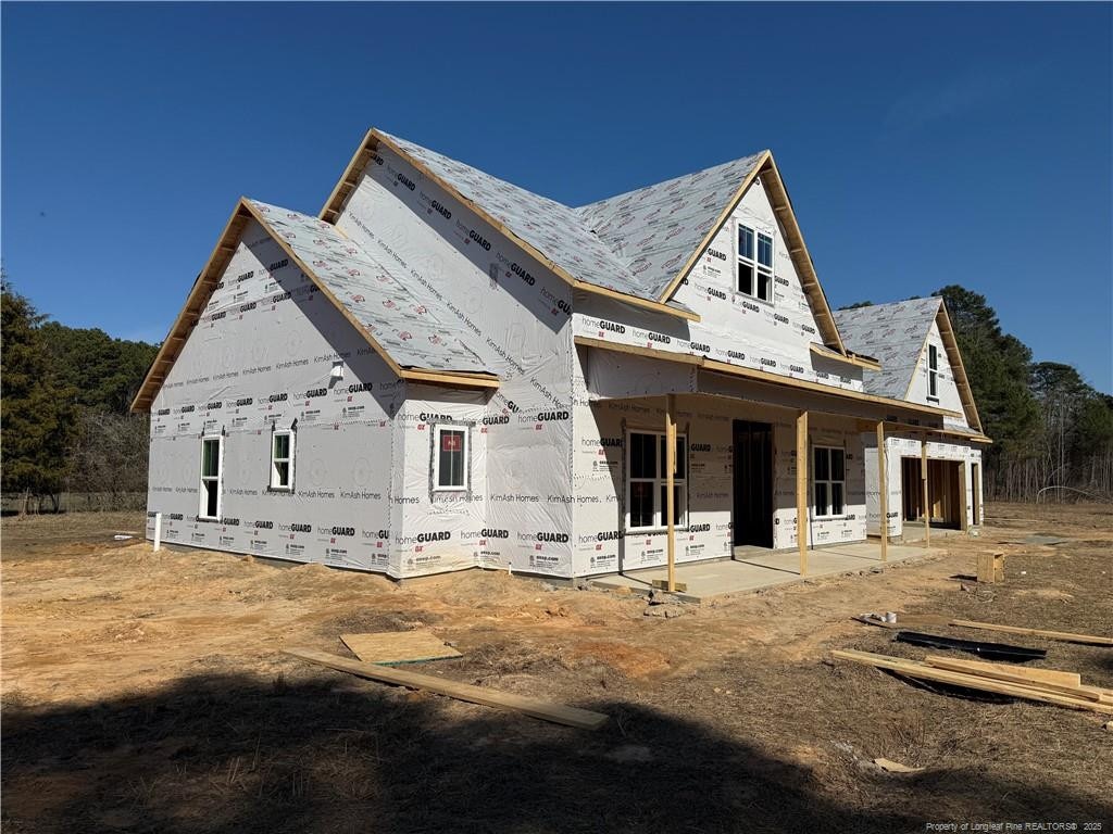 property in mid-construction featuring a patio