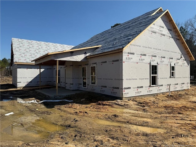 view of home's exterior with a patio area