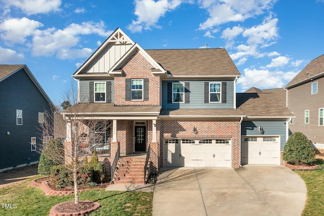 craftsman-style home with brick siding, a porch, board and batten siding, a garage, and driveway