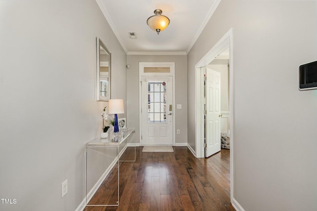 entryway with visible vents, ornamental molding, hardwood / wood-style flooring, and baseboards