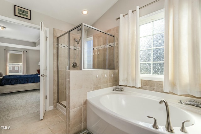 ensuite bathroom with a garden tub, recessed lighting, ensuite bathroom, a shower stall, and tile patterned floors