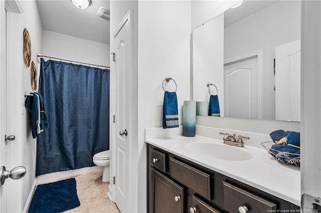 full bath with a shower with shower curtain, vanity, toilet, and tile patterned floors