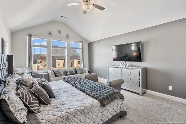 carpeted bedroom featuring visible vents, baseboards, vaulted ceiling, and a ceiling fan