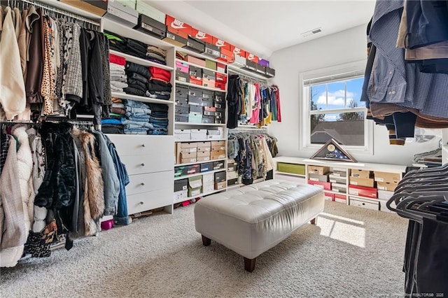 spacious closet with carpet floors and visible vents