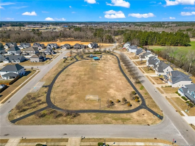 birds eye view of property with a residential view