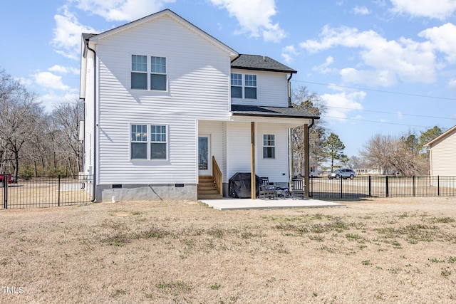 rear view of property with entry steps, a patio, crawl space, and fence