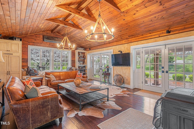 living area with wooden ceiling, a notable chandelier, wooden walls, vaulted ceiling, and french doors