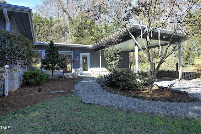 view of front facade with board and batten siding