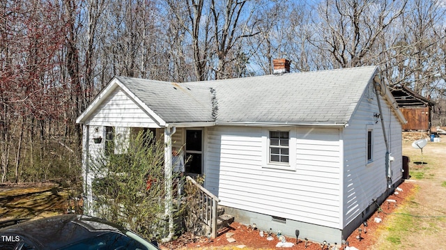 2778 Morton-Pulliam Rd, Roxboro, NC 27574 - view of front of home with a shingled roof, crawl space, and a chimney
