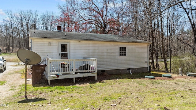 2778 Morton-Pulliam Rd, Roxboro, NC 27574 - back of house with crawl space, a wooden deck, a chimney, and a lawn