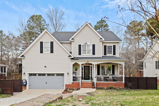 traditional home featuring a shingled roof, fence, a porch, concrete driveway, and a garage