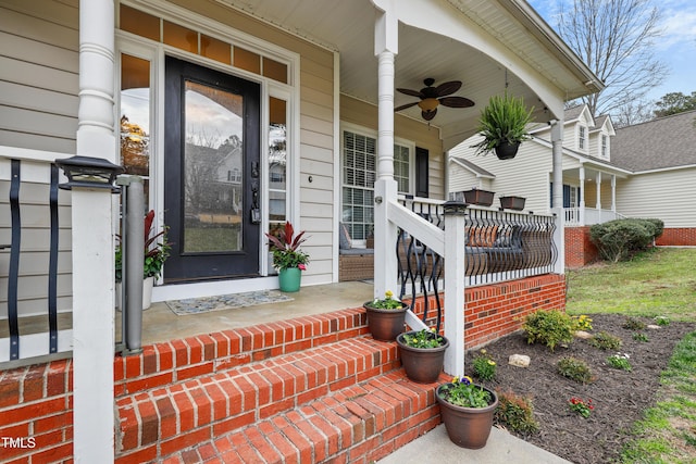 property entrance featuring covered porch and ceiling fan