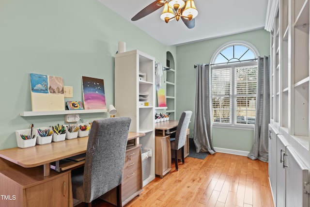 office with light wood-type flooring, baseboards, and ceiling fan