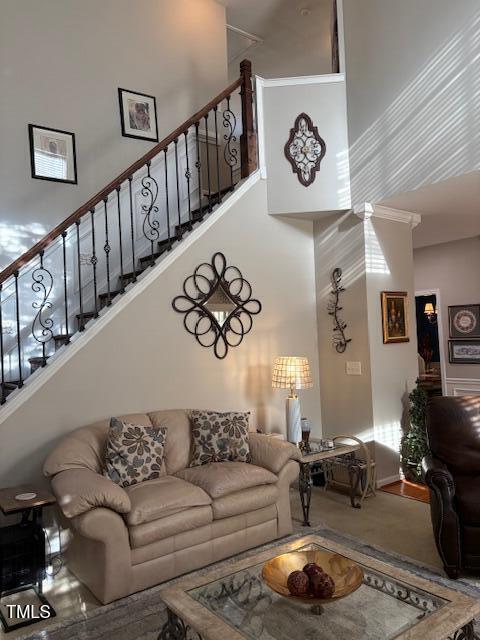 917 Widewaters Pkwy, Knightdale, NC 27545 - living area featuring a towering ceiling and stairs