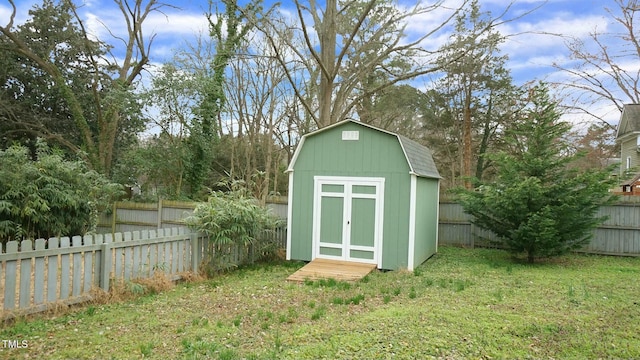 view of shed featuring a fenced backyard