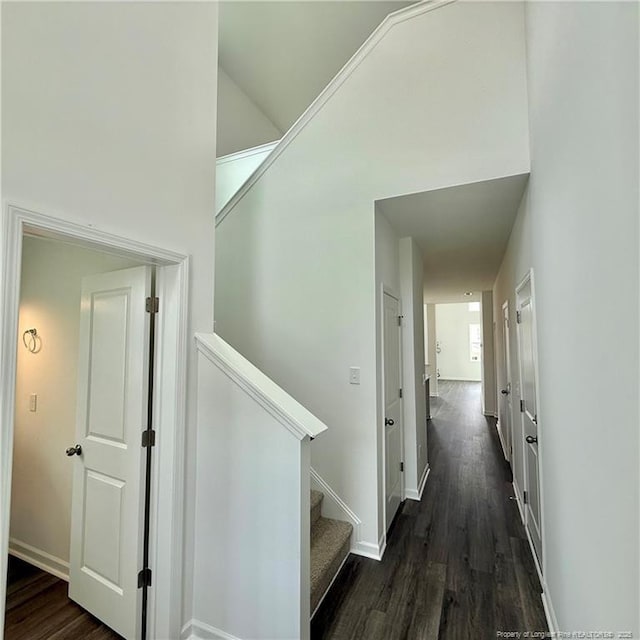 659 Union St, Home, Raeford, NC 28376 - hallway featuring dark wood-style floors and stairway