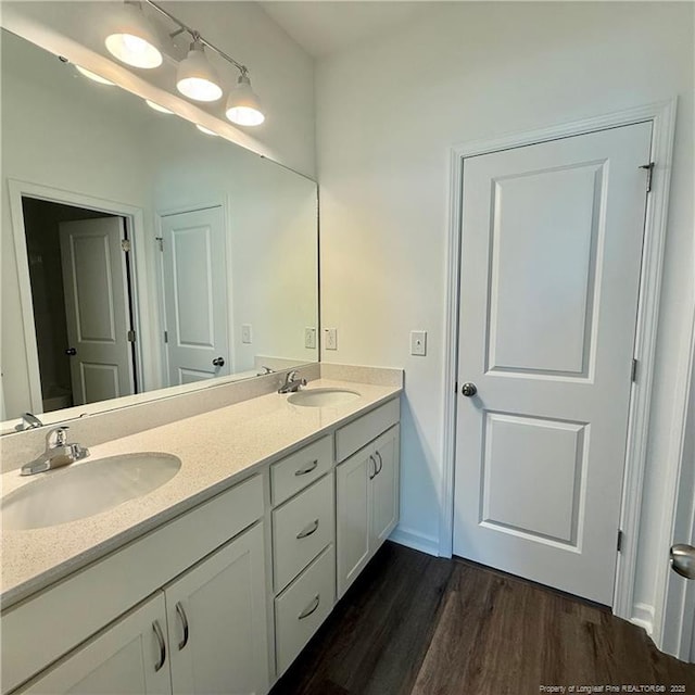 659 Union St, Home, Raeford, NC 28376 - bathroom with double vanity and wood finished floors